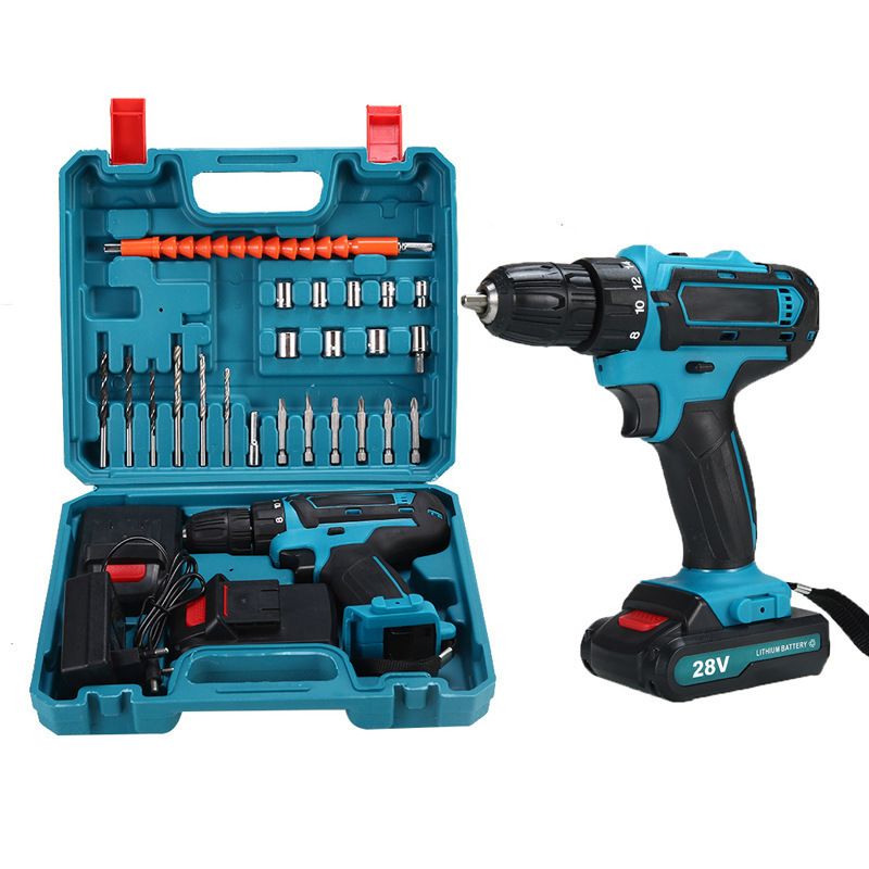 A cordless drill set shown with the drill and its open storage case on a white background. The drill is teal and black with a red trigger, and the case contains multiple drill bits, a brush cleaner, and a battery.