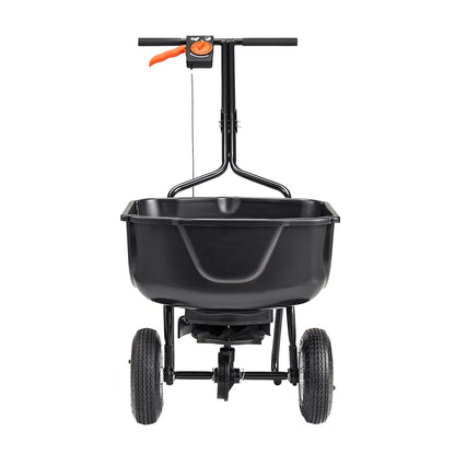Black fertilizer spreader with 'Vevor' branding on a white background
