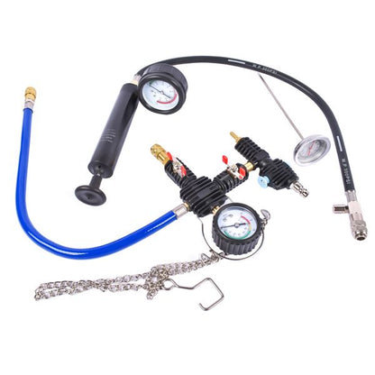 Automotive pressure testing kit with hoses and gauges on a white background