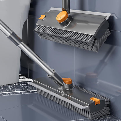 Cleaning tool with brush head and handle on a tiled floor