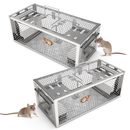 Two mouse traps with live mice on a white background