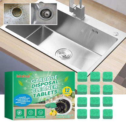 Stainless steel kitchen sink with garbage disposal cleaner tablets and packaging on a wooden countertop.