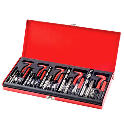 Set of tools in a red toolbox on a white background