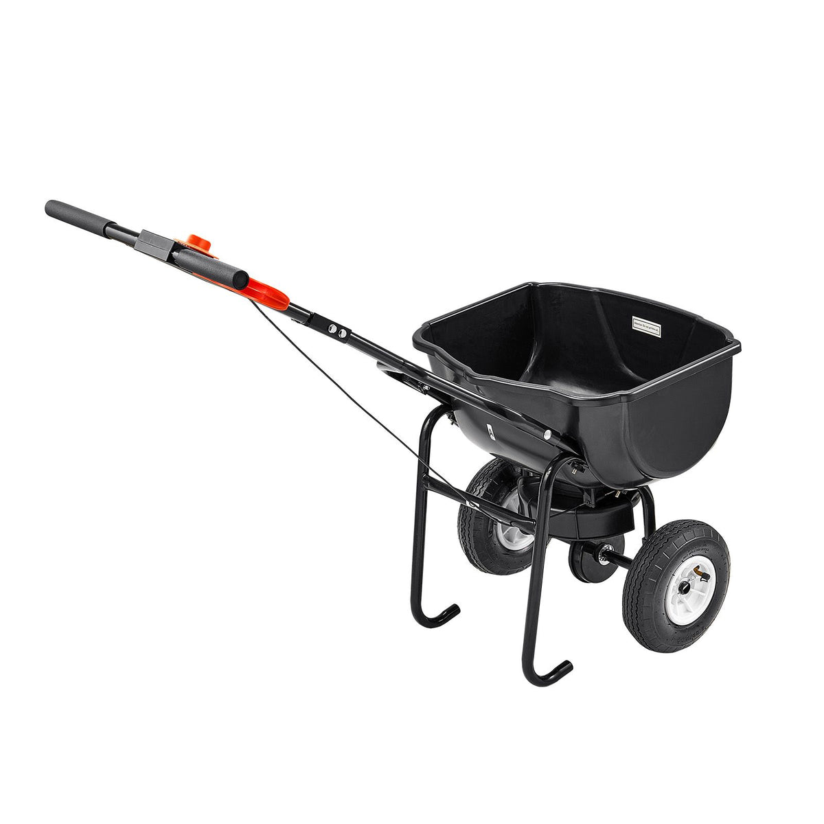 Black fertilizer spreader on a white background