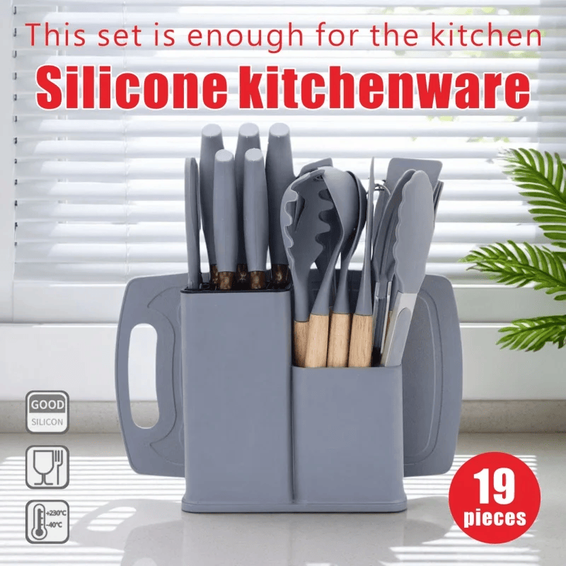 Silicone kitchen utensil set with holder on a light background