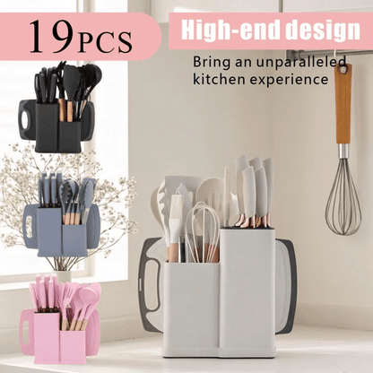 A 19-piece kitchen utensil set displayed in three colorways: black, blue-gray, and pink. The image showcases the products both individually hanging on a wall and grouped together inside a white double-compartment holder, set against a clean kitchen background.