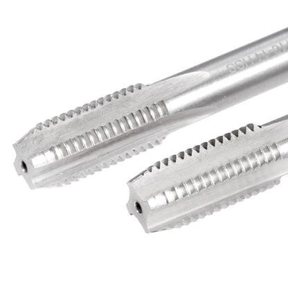 Two metallic tools with teeth on a white background