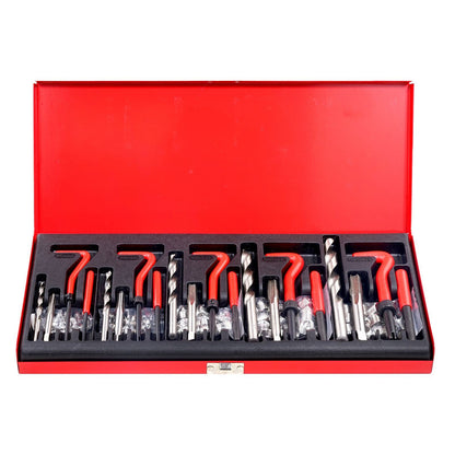 Set of drill bits in a red and black tool box on a white background