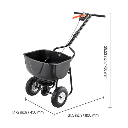 A black wheelbarrow-style garden spreader with a handle and measurement annotations showing width, depth, and height on a white background.